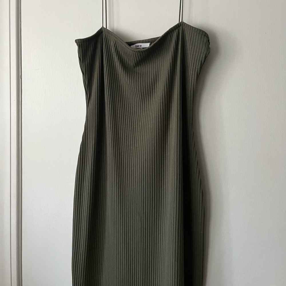 Green bodycon dress with thin striped straps